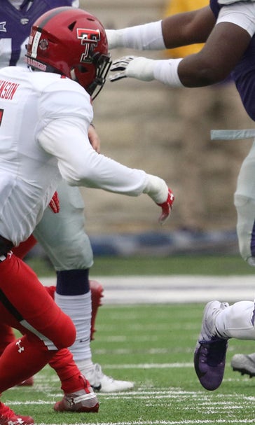 Wildcats' bowl hopes remain alive with 21-6 victory over Red Raiders